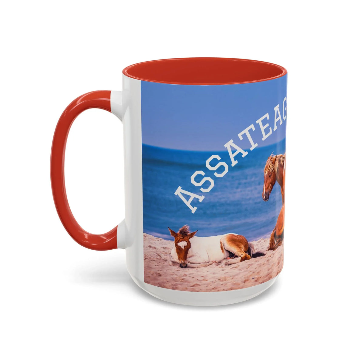 Ceramic coffee mug featuring Assateague wild horses on a beach with a red interior and handle.