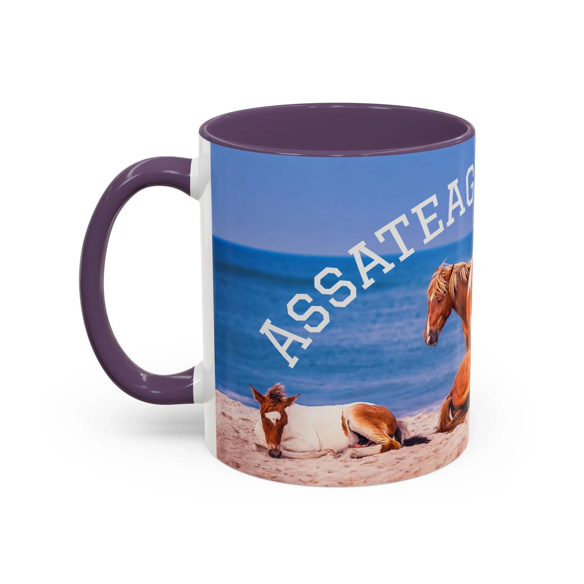 Ceramic coffee mug featuring wild horses on Assateague beach with blue ocean background.
