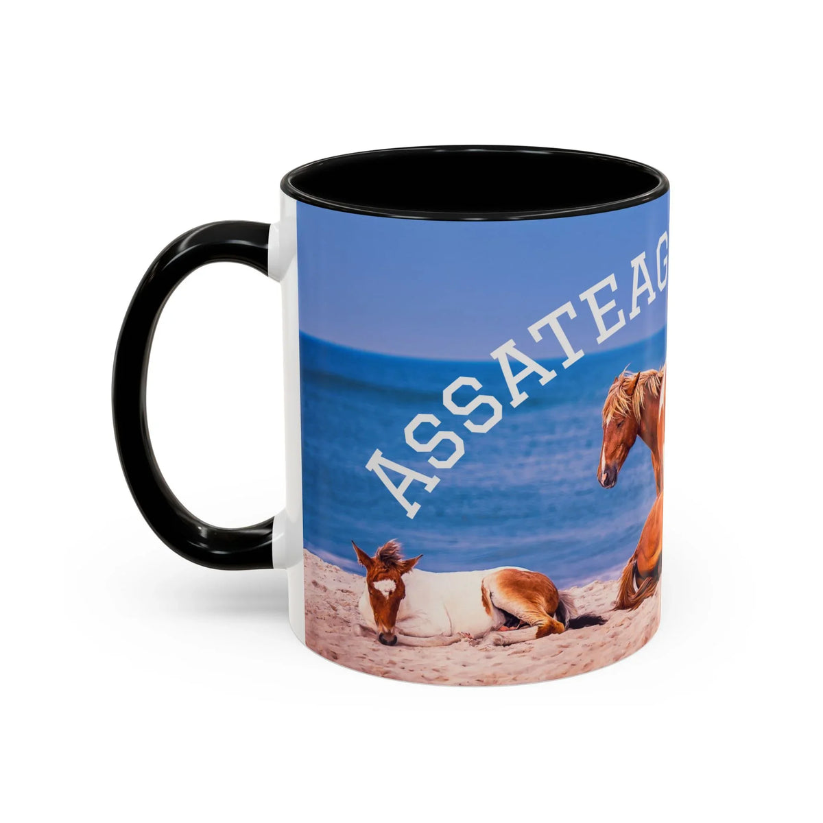 Ceramic coffee mug featuring wild horses on an Assateague beach scene.