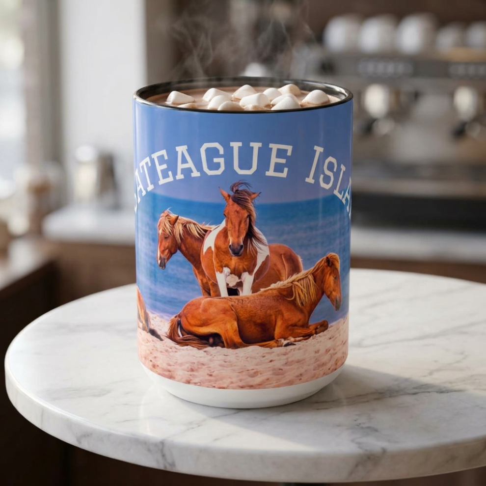 Travel tumbler with Outer Banks wild horses and beach scene on a marble table.