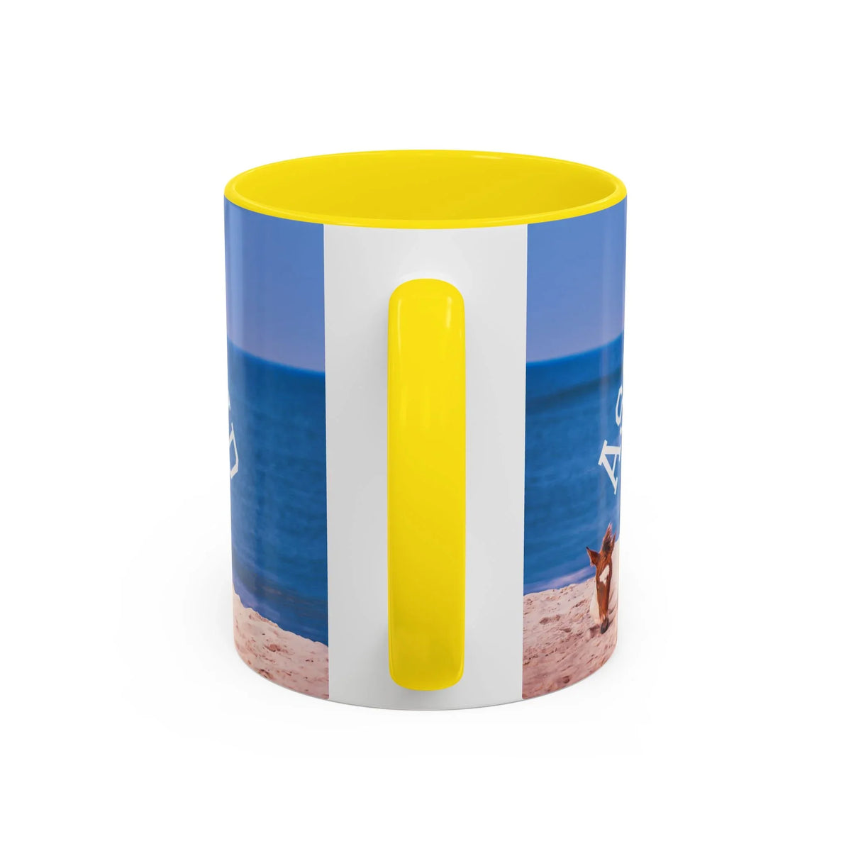 Ceramic coffee mug with beach scene and wild horse decor, featuring a bright yellow handle.